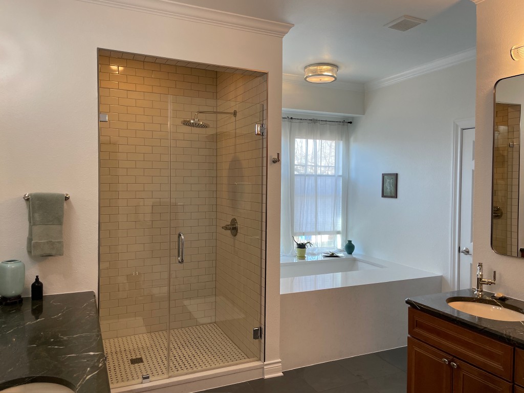 Spa bathroom with walk-in shower and soaking tub